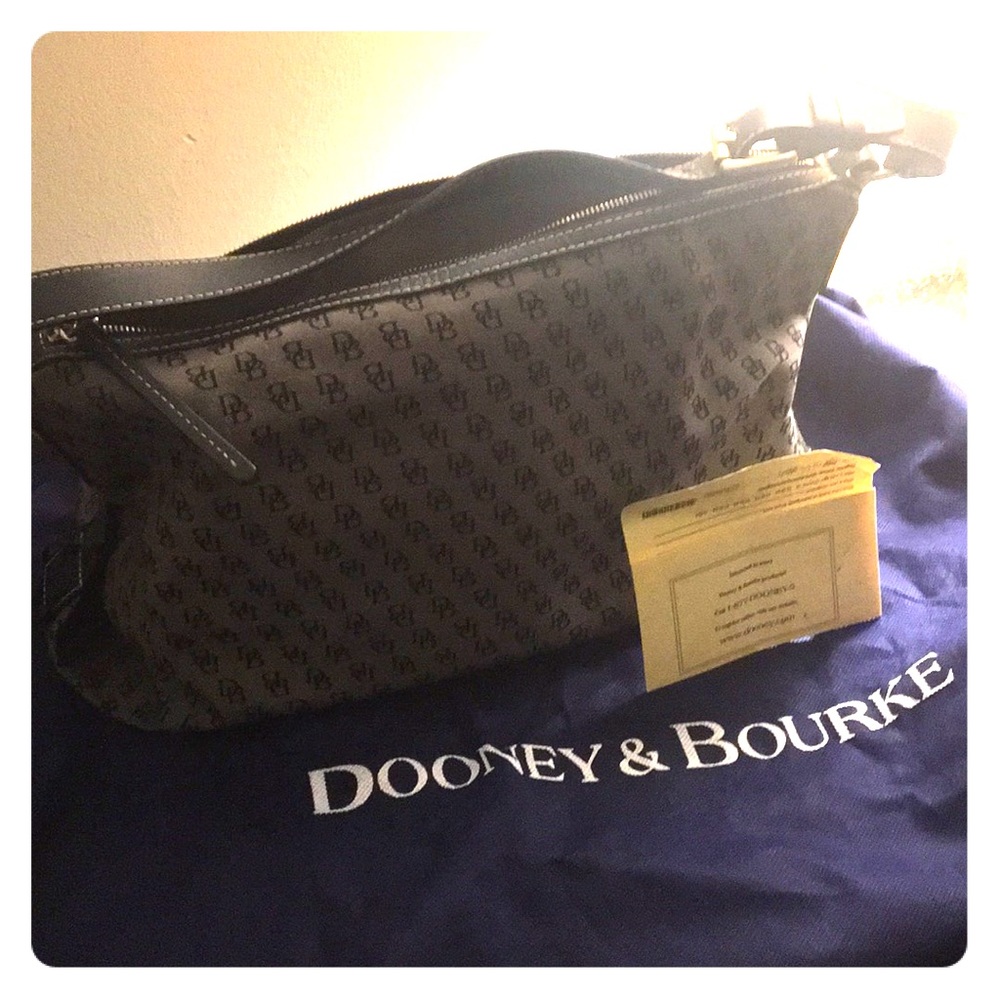 Vintage east/west Dooney and Bourke slouch